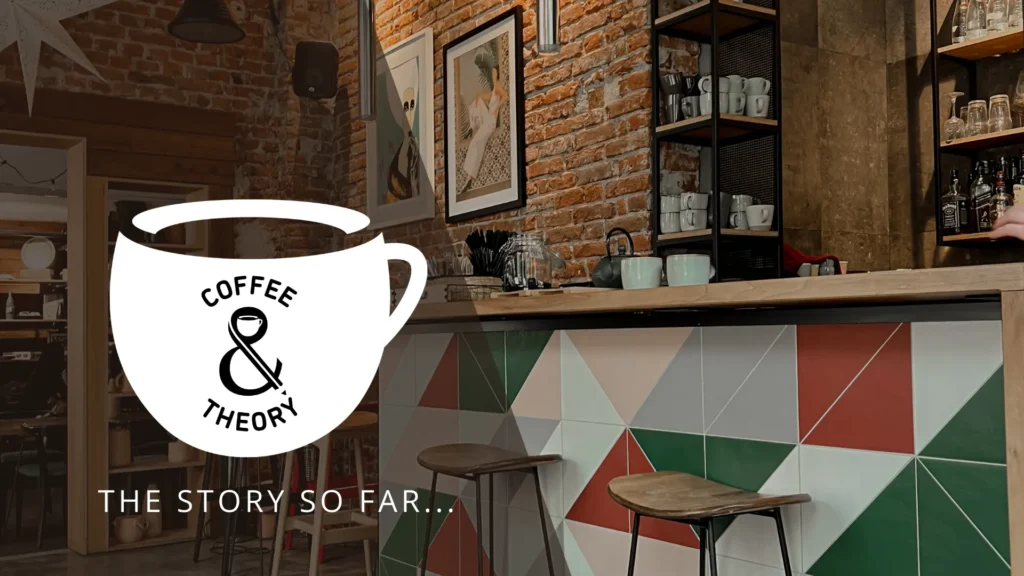 Coffee shop interior with the Coffee & Theory logo, representing reflection, learning, and thoughtful conversations.