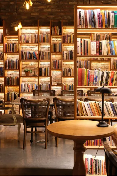 Bookshelves and reading tables in a library, representing education research and learning